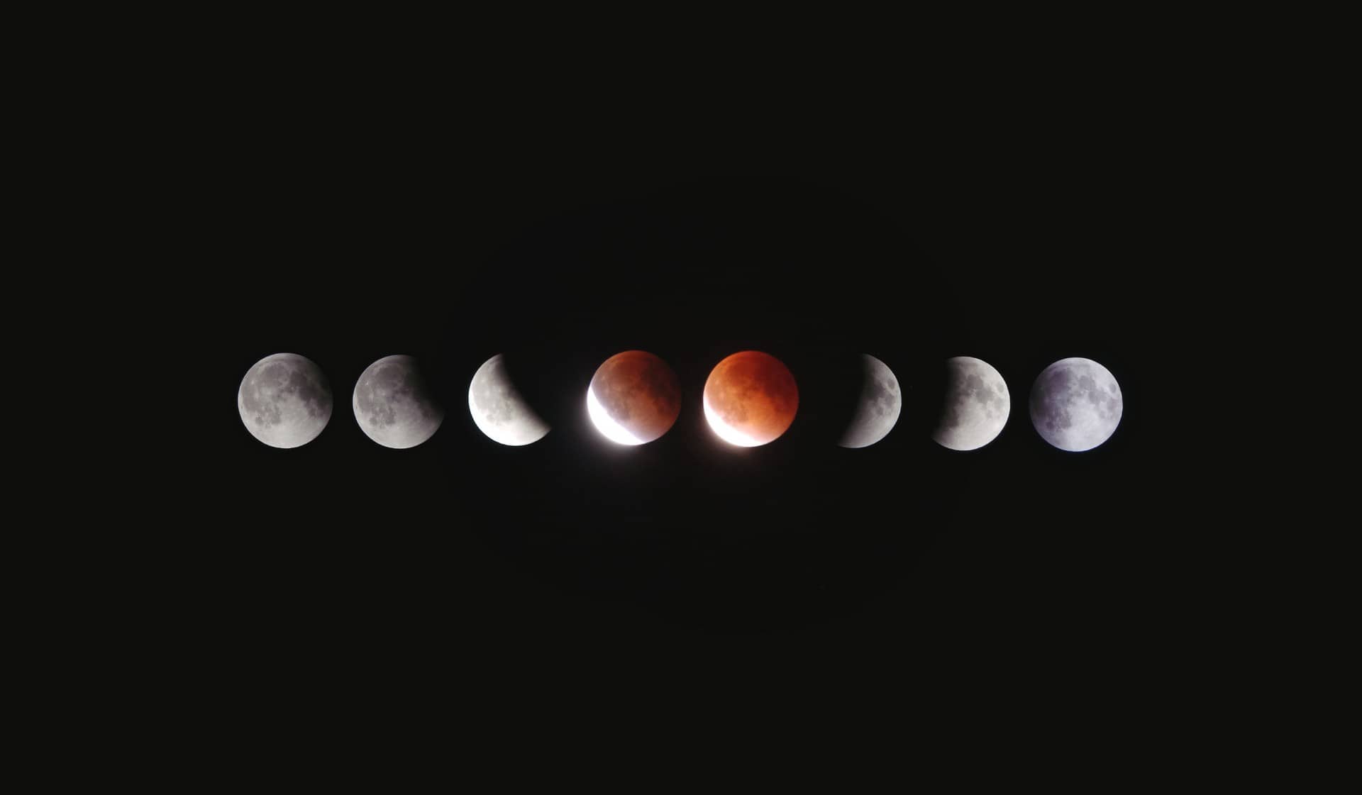 An image showing different lunar phases. There are eight different pictures of the moon, aligned next to each other in a row.